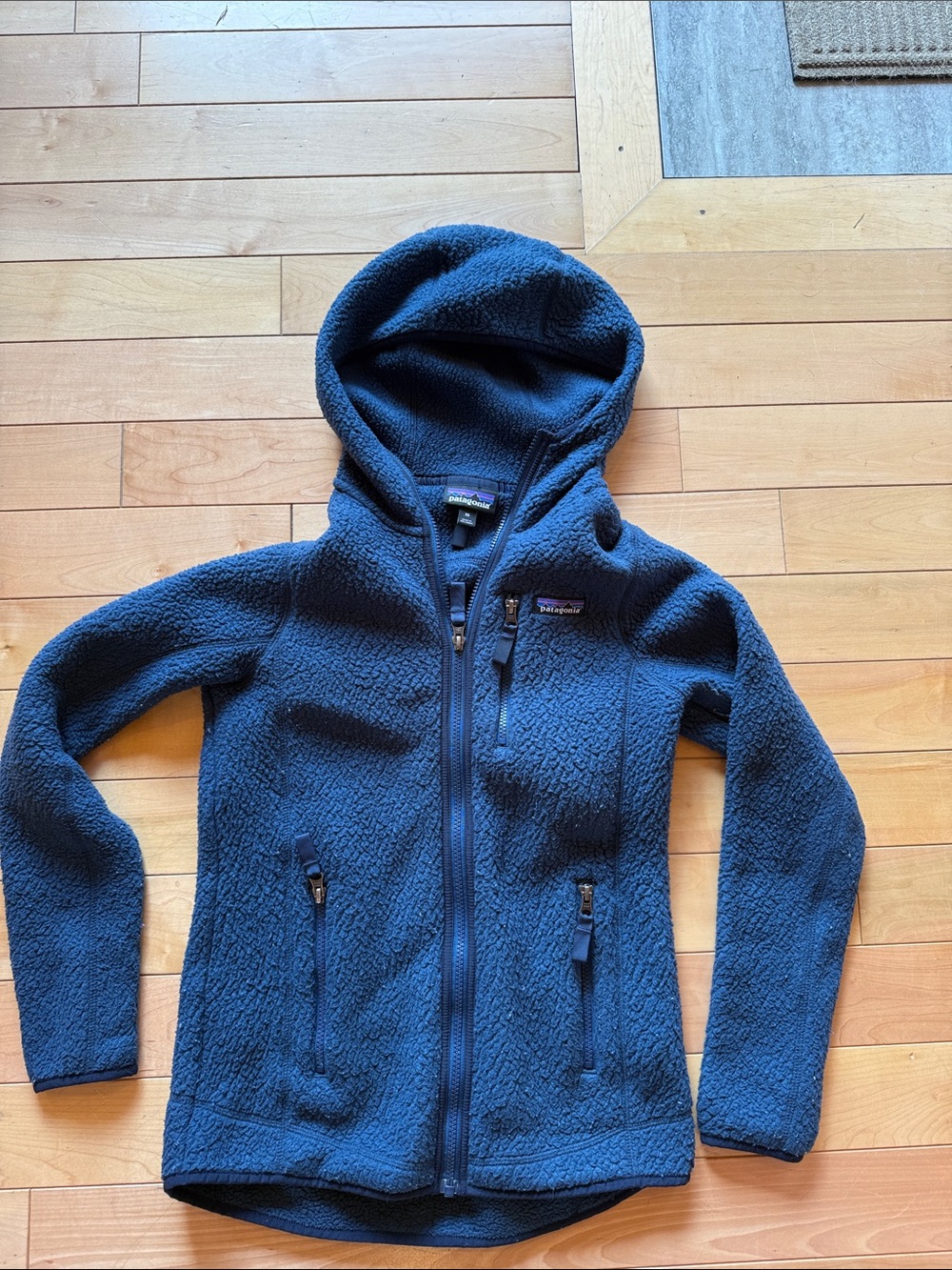 Patagonia women’s Navy Blue Hooded Fleece Jacket